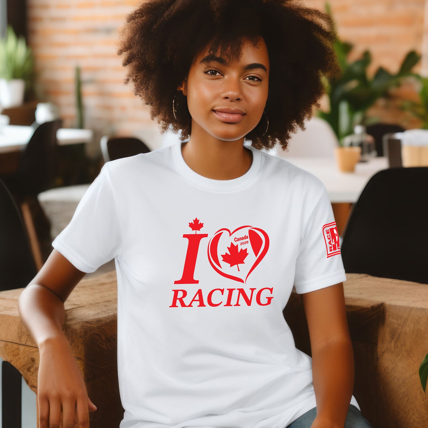 Female model wearing white I Love Racing Canada Track Week 2026 t-shirt with maple leaf heart graphic