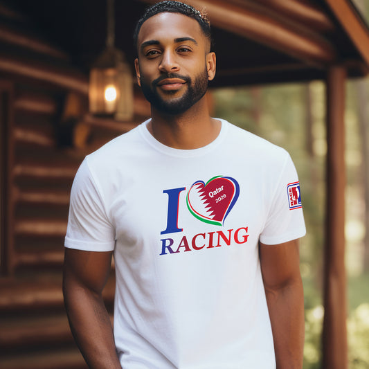 Male model wearing white I Love Racing Qatar Track Week 2026 t-shirt with Qatar flag heart graphic