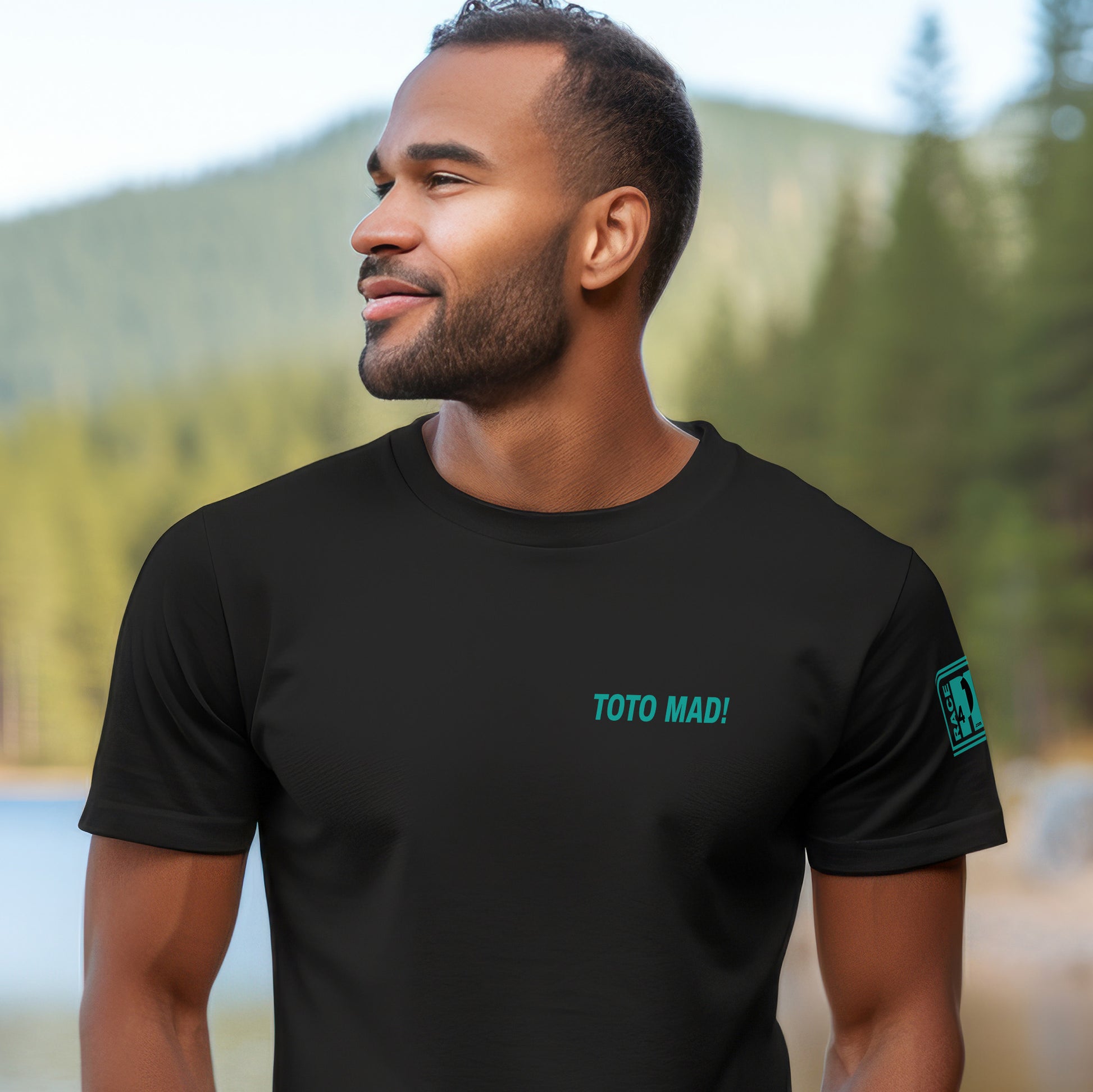 Man wearing TOTO MAD! left chest black tee – Race4P1 Originals motorsport lifestyle tee with small teal print