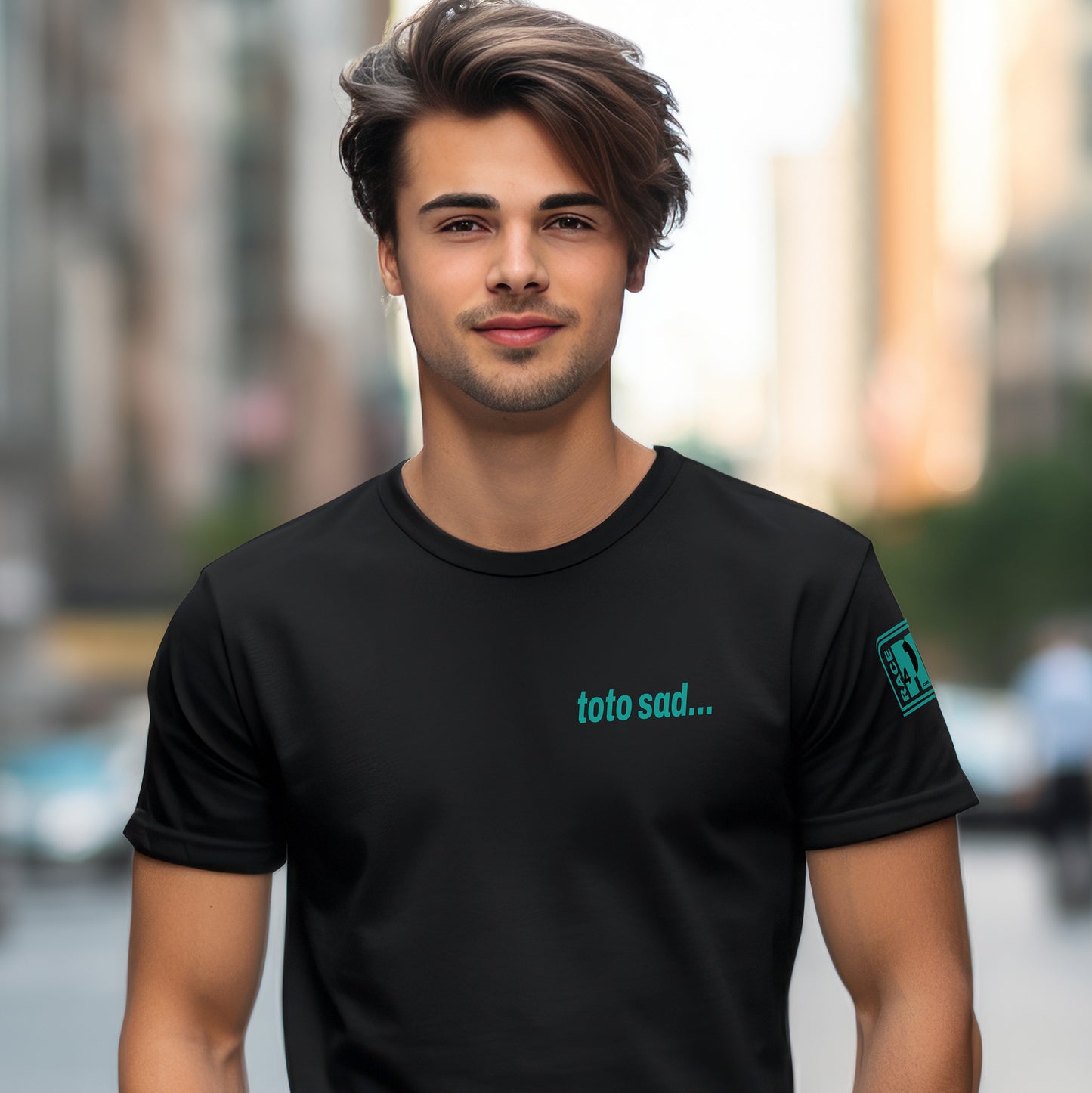 Man wearing TOTO SAD left chest black tee – Race4P1 Originals motorsport lifestyle tee with small teal print
